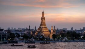 Chao River and Buddhist Tower Bangkok, Thailand